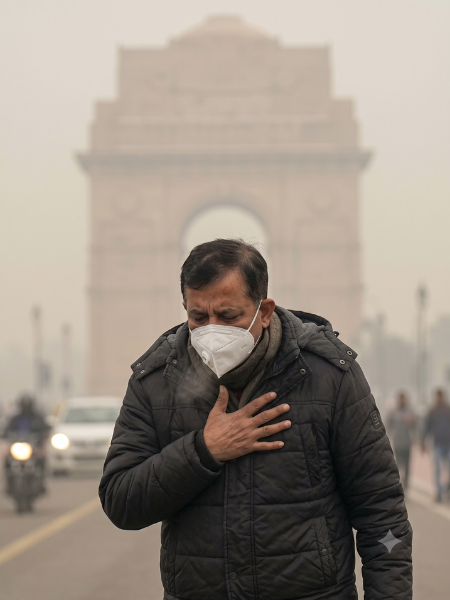 Heavy winter air pollution and smog covering Delhi NCR, highlighting the hazardous conditions that cause persistent respiratory issues and chronic cough.